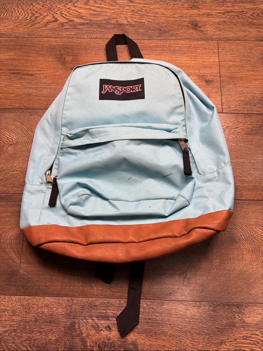 Jansport Light Blue Backpack with Brown Leather-Style Base